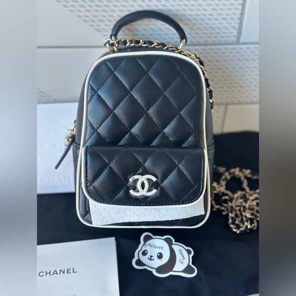 CHANEL Handbags - New Authentic CHANEL MINI BACKPACK BAG Crossbody BLACK WHITE TRIM 25P
